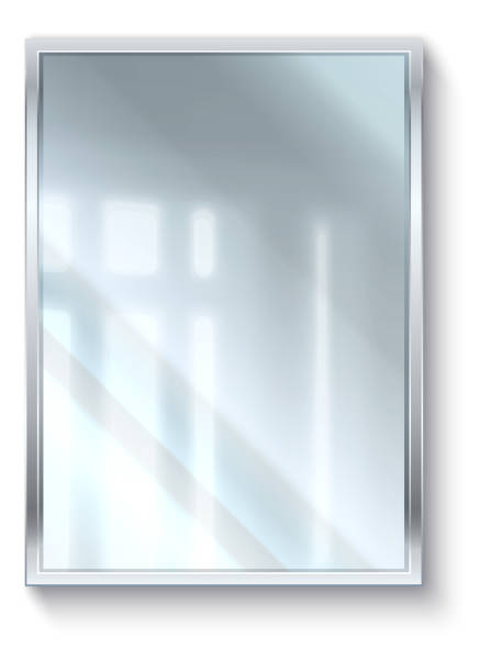 A rectangular wall mirror with a silver frame reflecting light and window patterns, perfect for enhancing your interior design and making any room look bigger.